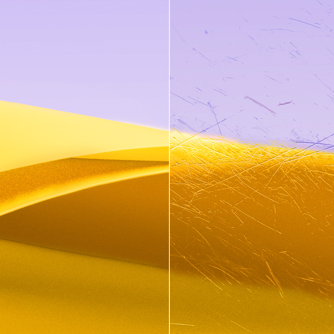 Delad bild av ett klart, rent glas med ZEISS DuraVision Gold UV och ett repigt glas.