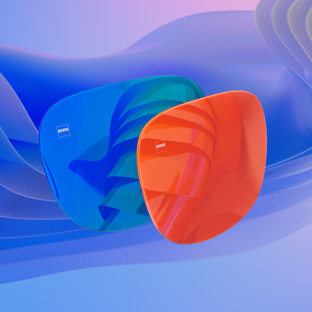 3D CGI-illustration av två solglasögonglas med en blå och en orange spegelbeläggning.