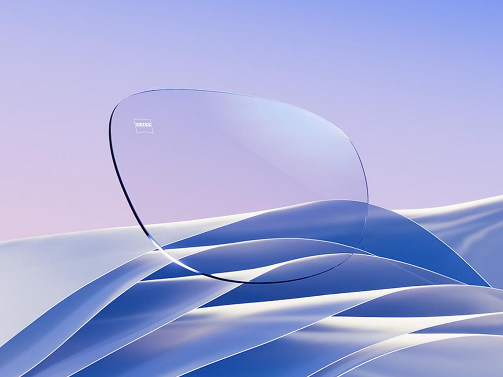 En CGI-visning av ett klart glasögonglas med en diskret blå-vit reflex.