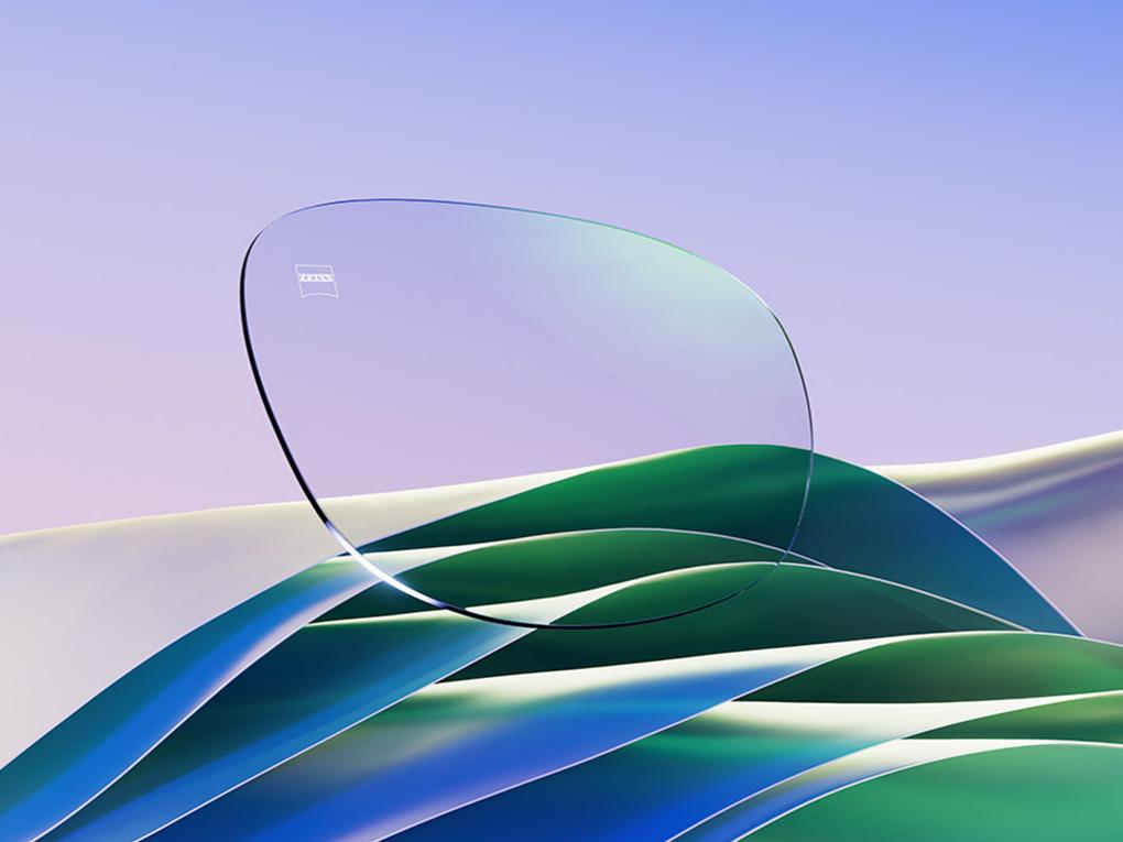 En CGI-visning av ett klart glasögonglas med en diskret grön reflex.
