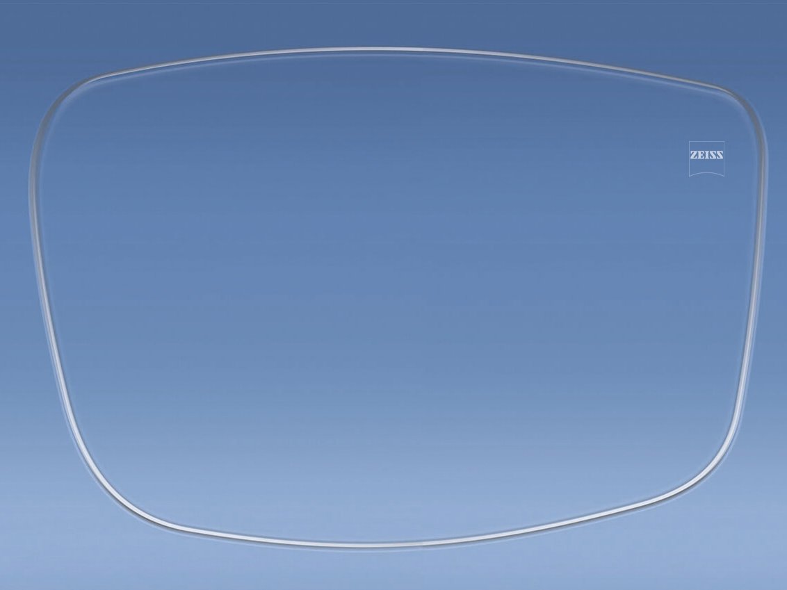 Illustrering av ett glasögonglas med och utan antireflekterande ytbehandling 