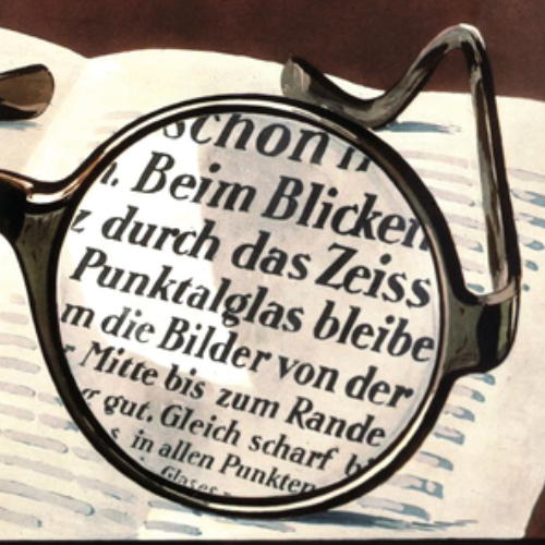 En bild av en gammal annons för ZEISS Punktal-glas, som visar hur skarpt man ser genom hela glaset. Detta var revolutionerande år 1912. 